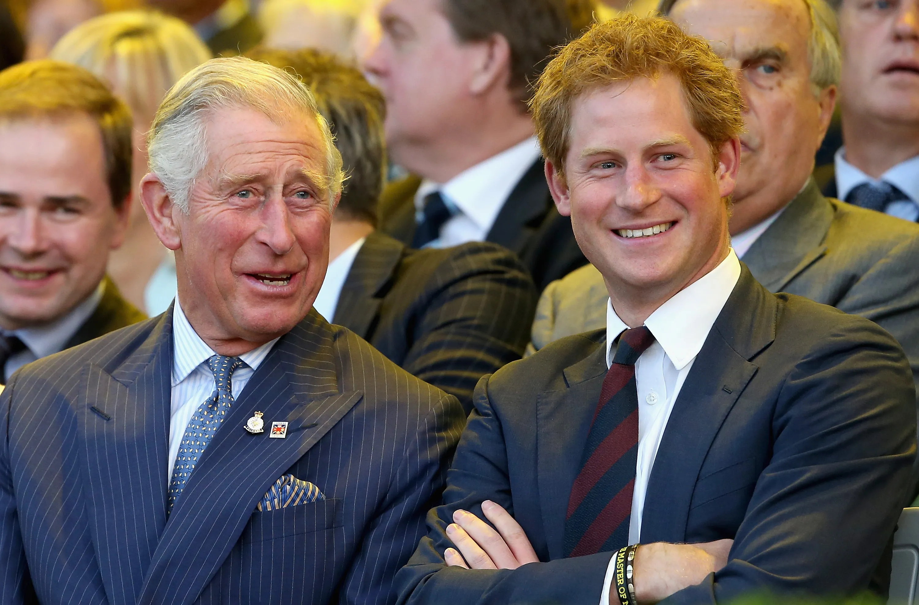Prince Charles and Prince Harry laughing at the Invictus Games Opening Ceremony.