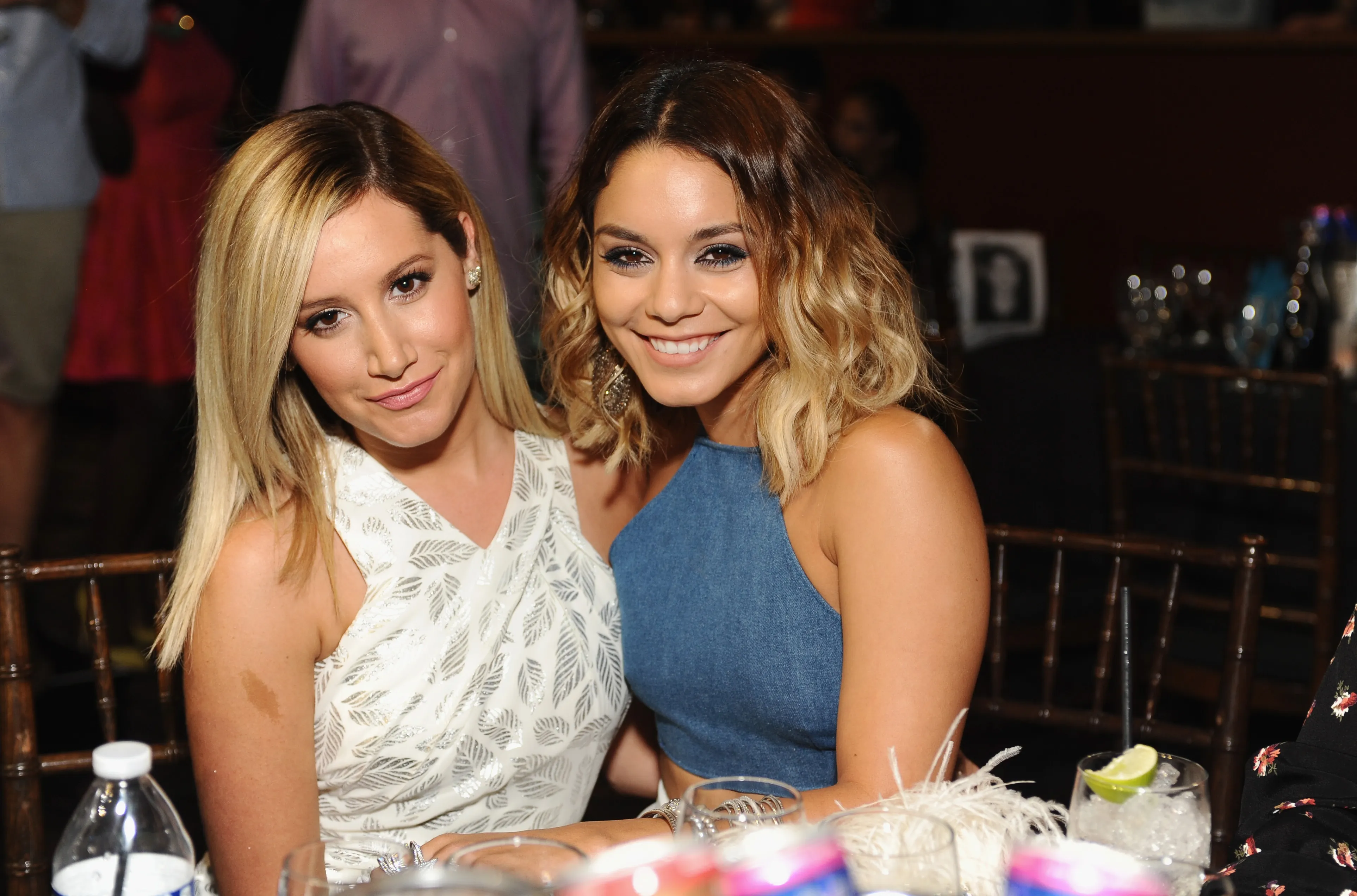 Actresses Vanessa Hudgens and Ashley Tisdale smiling at the Young Hollywood Awards.