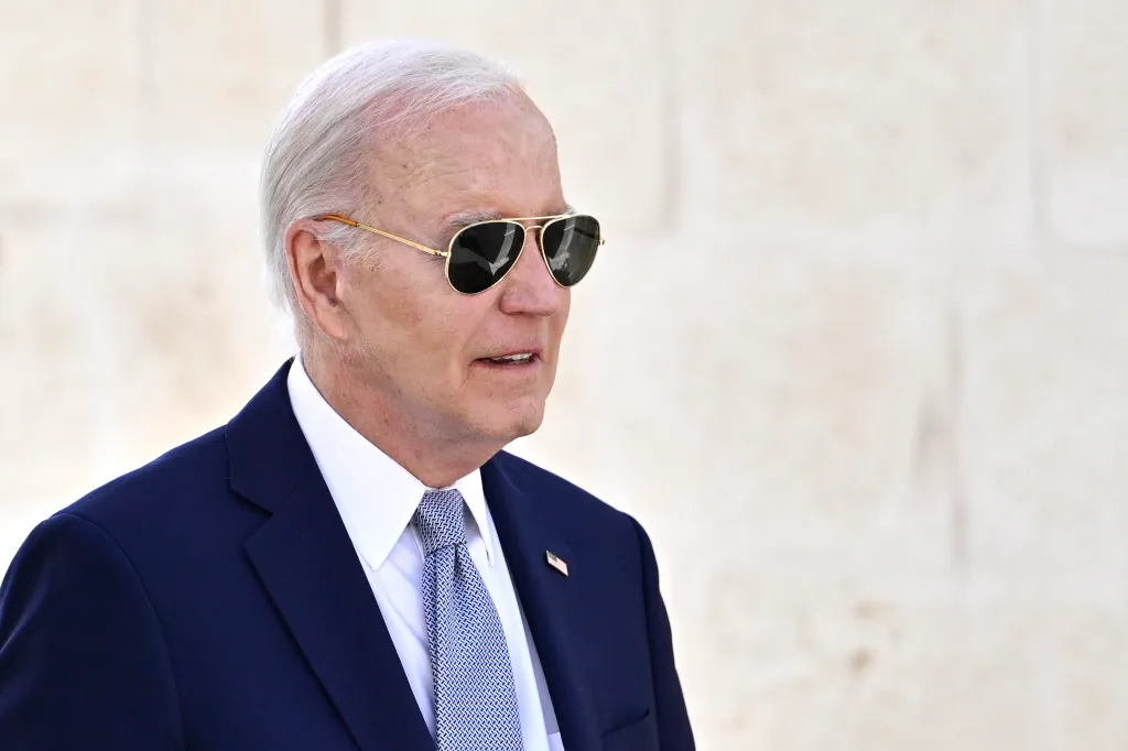 U.S. President Joe Biden wearing sunglasses at the G7 summit.