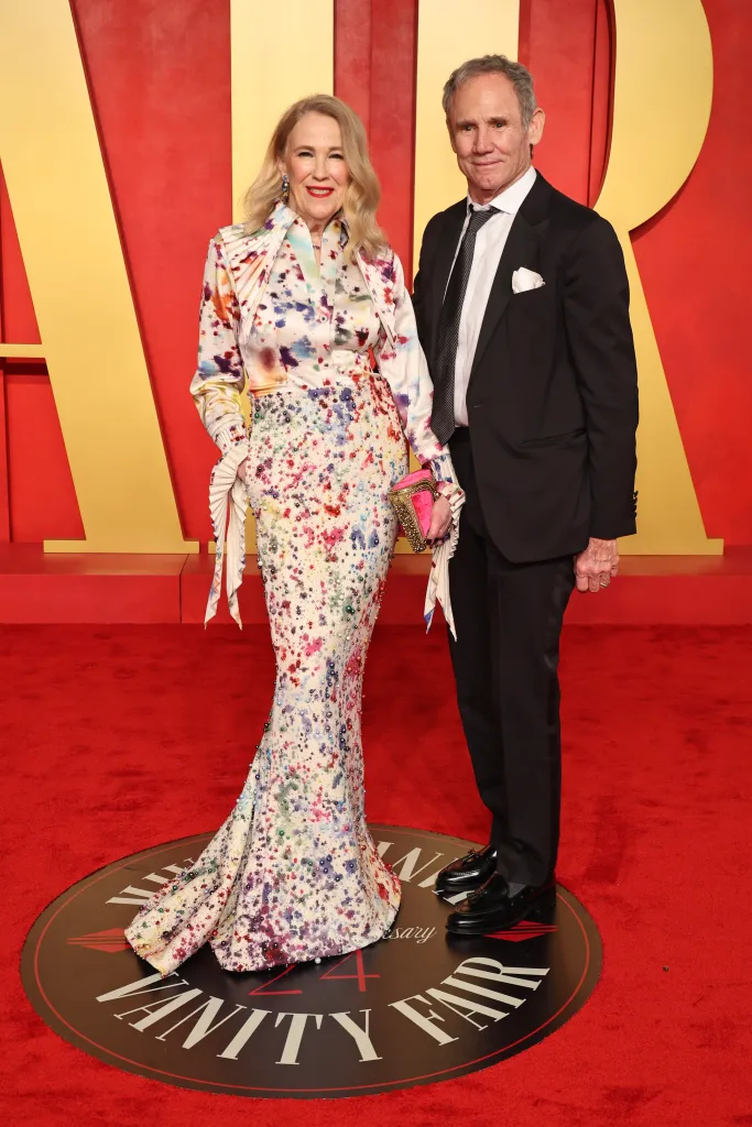 Catherine O'Hara and Bo Welch on the red carpet at the Vanity Fair Oscar Party.
