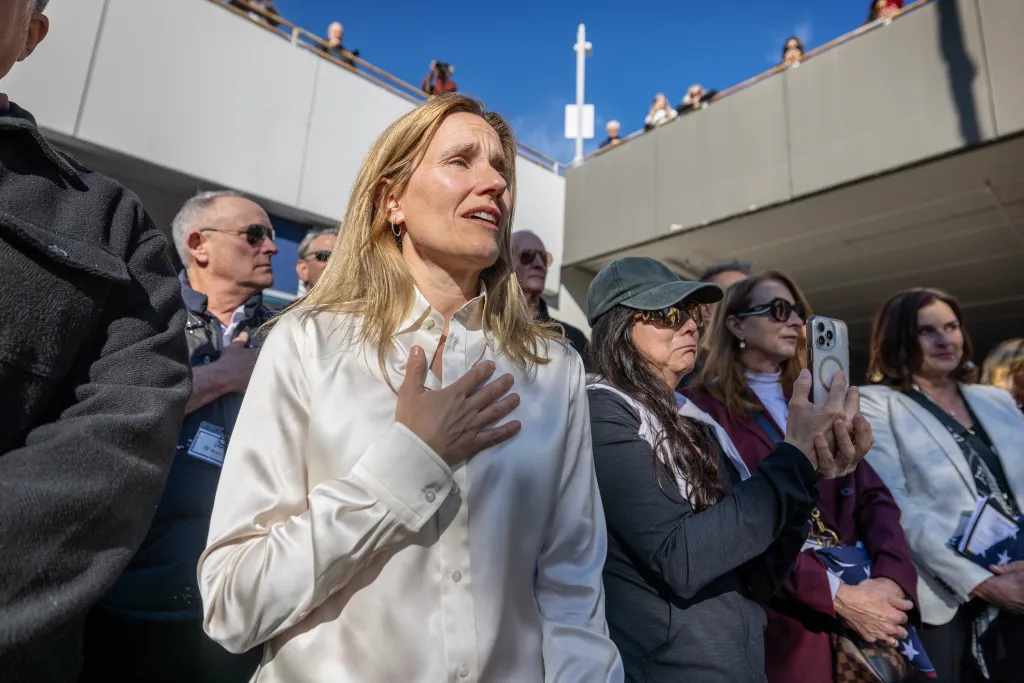 Lorie Cudzil at a rally for the anniversary of the Palisades Fire.