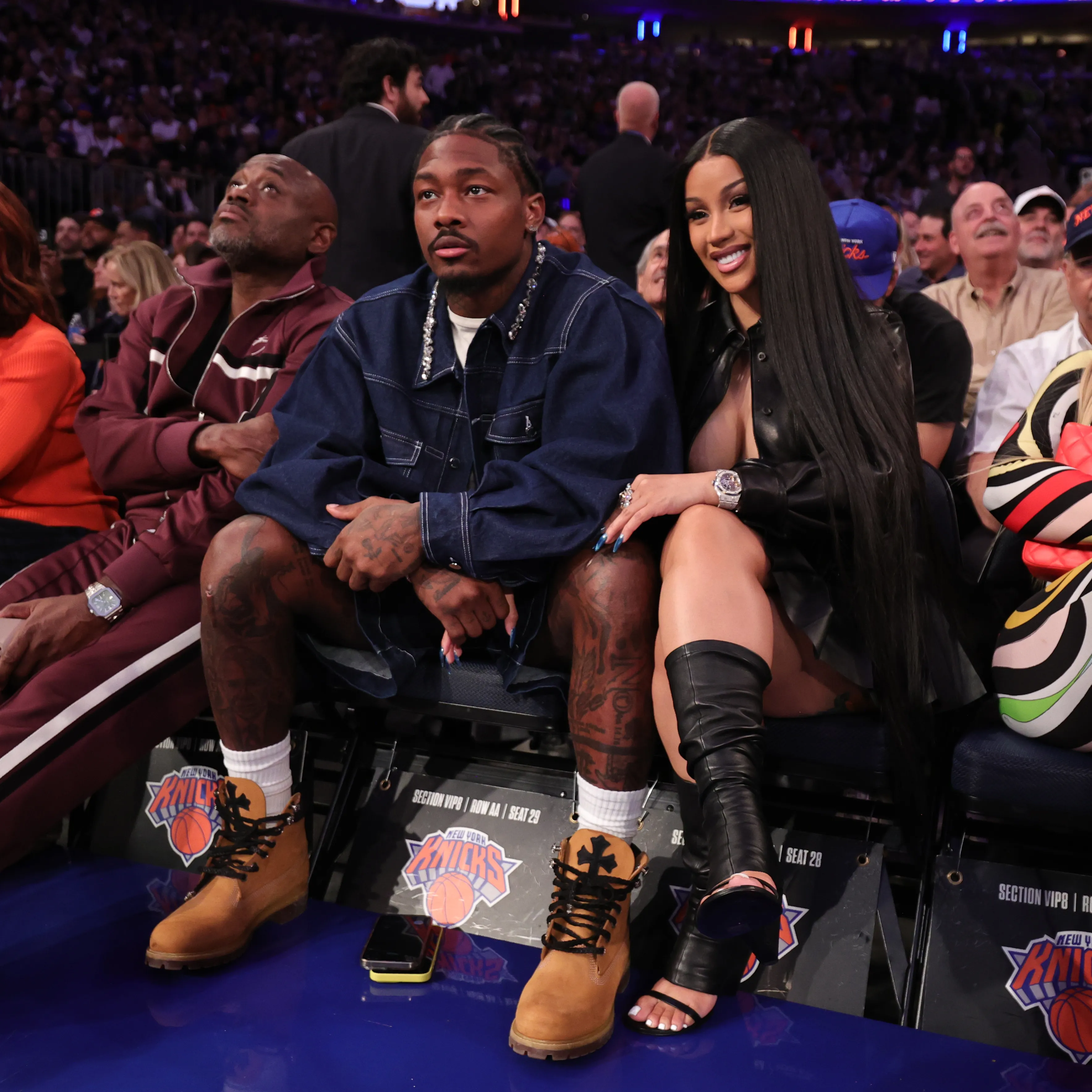 Stefon Diggs and Cardi B attend an NBA Playoffs game between the Boston Celtics and the New York Knicks.