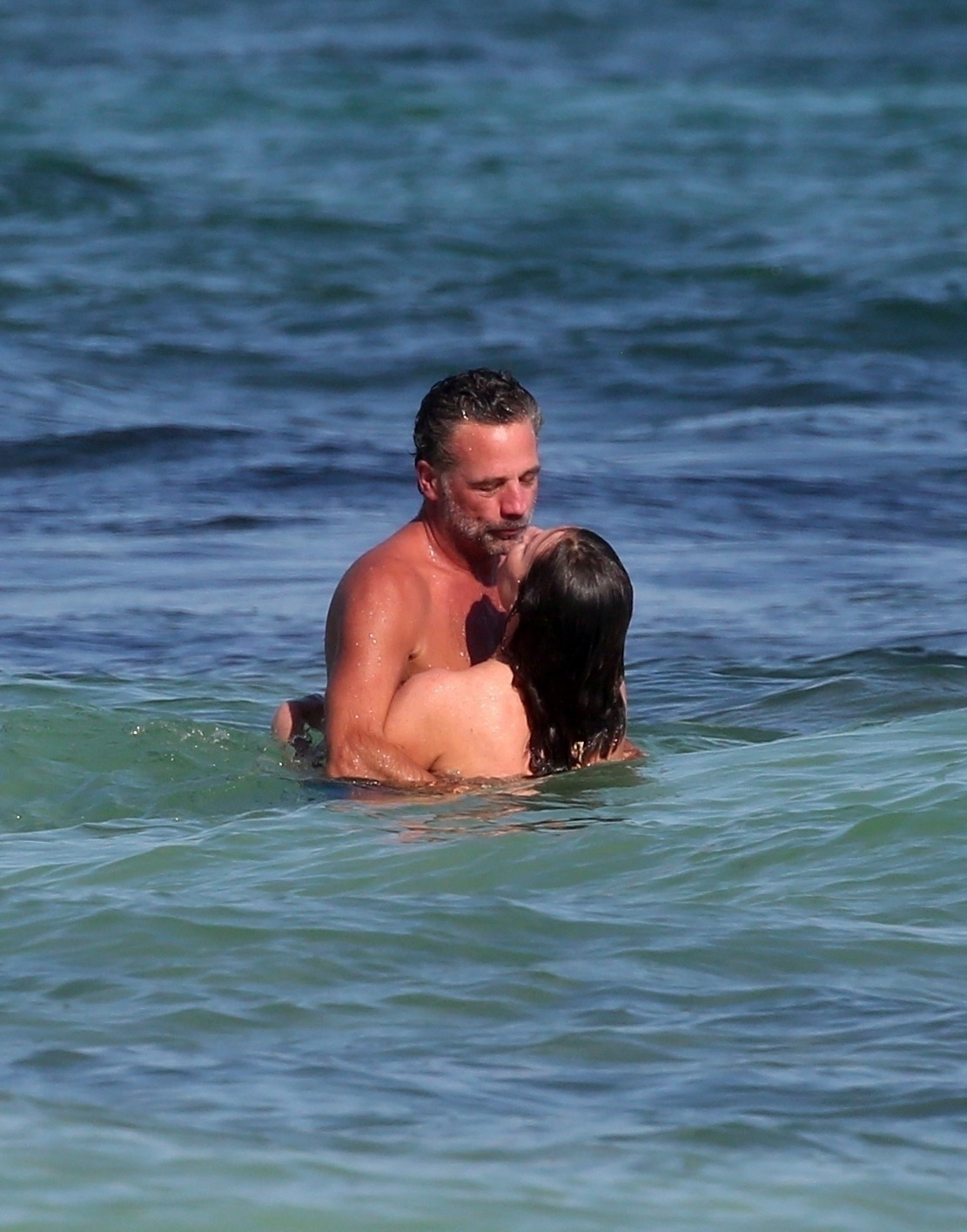 Luann De Lesseps and Michael Riemerschmid embracing in the Caribbean Sea.