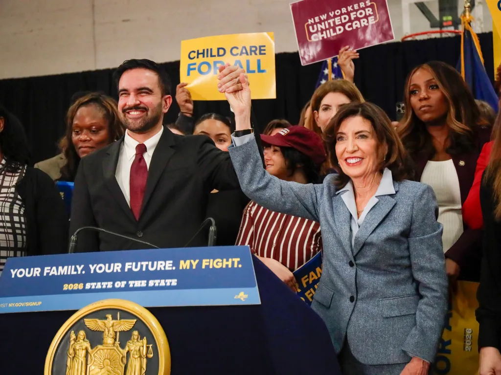 hochul and mamdani at a press event announcing free child care