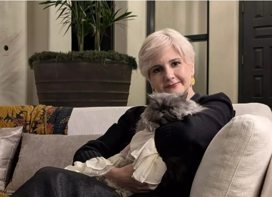 Aryan Papoli holds her cat.