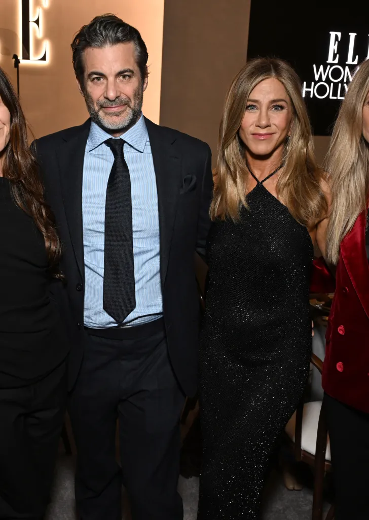 Kristin Hahn, Jim Curtis, Jennifer Aniston, and Andrea Bendewald at ELLE's 2025 Women in Hollywood Celebration.