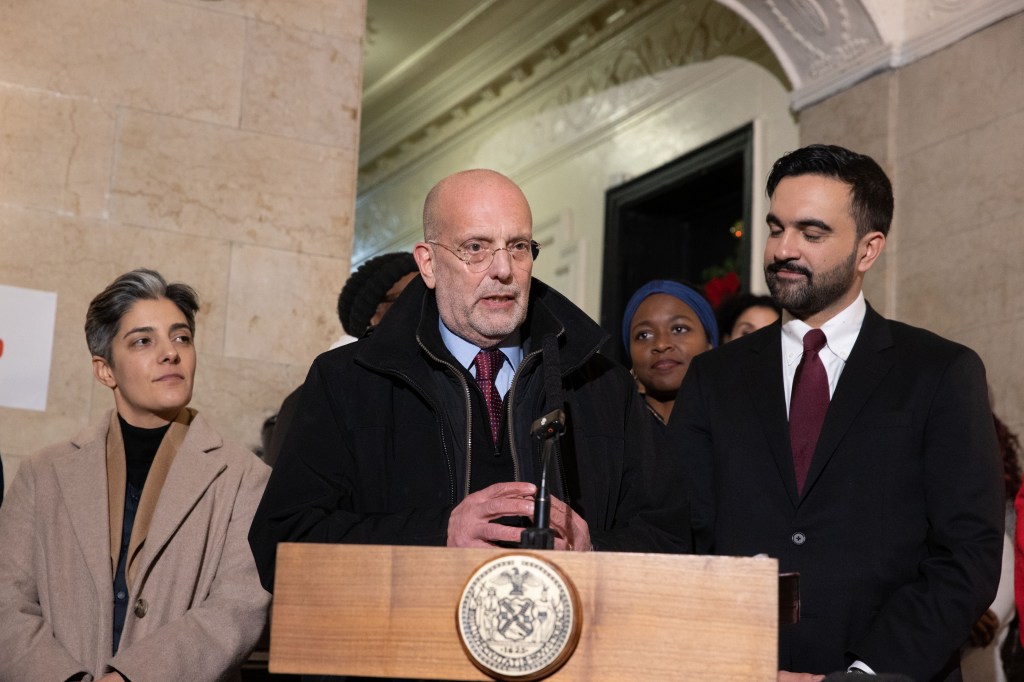 Steven Banks speaking at a press conference with Mayor Zohran Mamdani to his right.