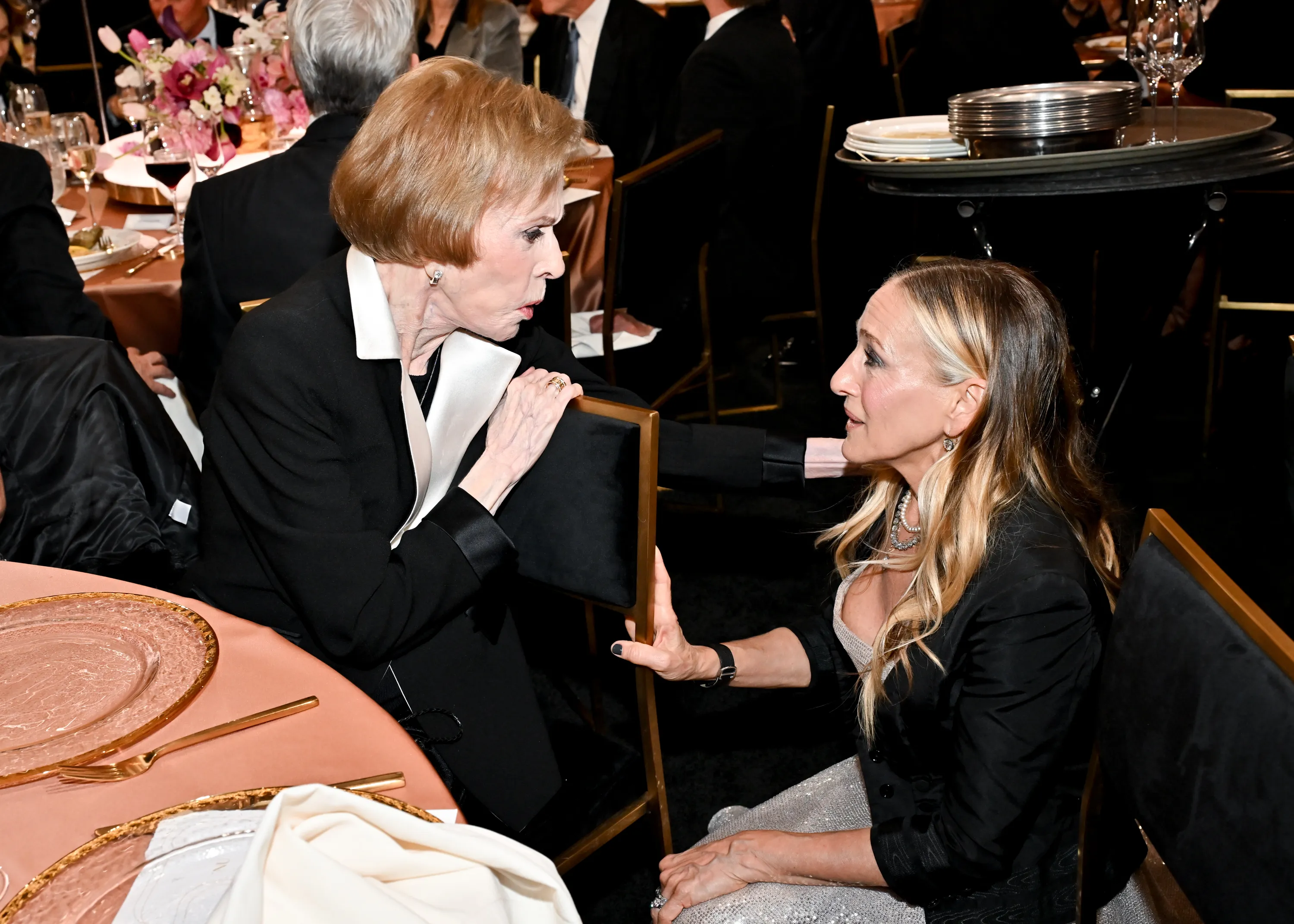 Carol Burnett and Sarah Jessica Parker talking together during the special night's festivities.