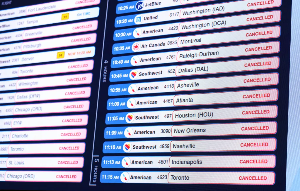 A board of flight cancellations at LaGuardia Airport in New York City.