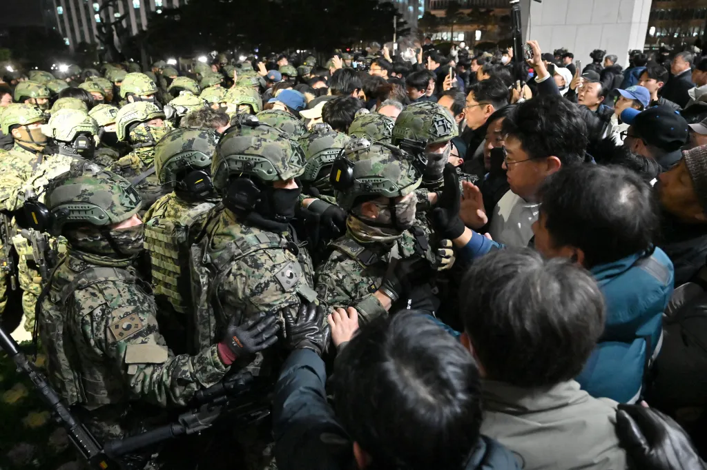  Soldiers try to enter the National Assembly building in Seoul on December 4 2024, after then-South Korea President Yoon Suk Yeol declared martial law.