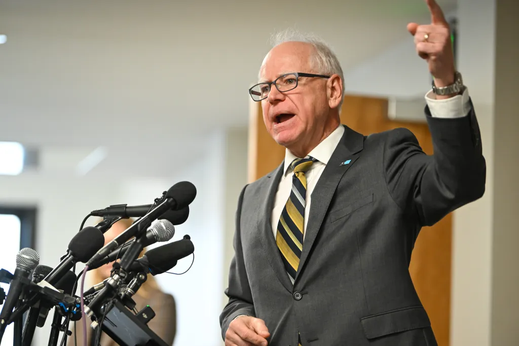 Democratic Governor of Minnesota Tim Walz at a press conference.