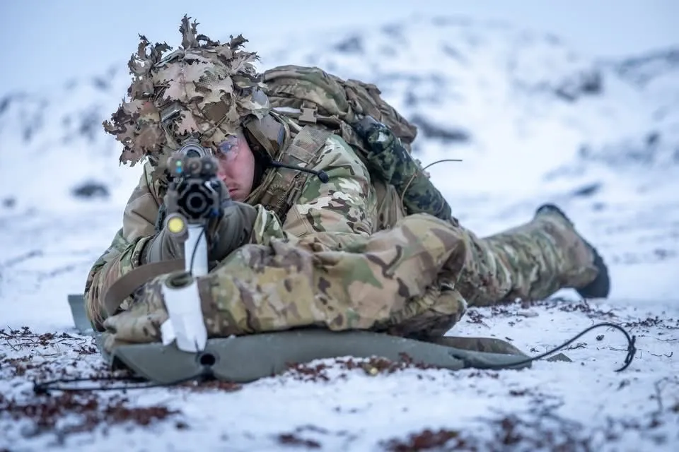 Danish Army soldiers at a shooting range in Greenland shortly after they arrived in Greenland as part of the Arctic Endurance exercise on Monday Jan 19, 2026, they headed out to the shooting range. Here, they had to zero in their weapons and get their first lessons on how to handle their weapons in freezing temperatures, wind, and snow. The exercise focuses on defending NATO's northern flank. A number of NATO partners are also participating in the exercise, both with soldiers and with planning. (The Danish Armed Forces via EYEPRESS)
