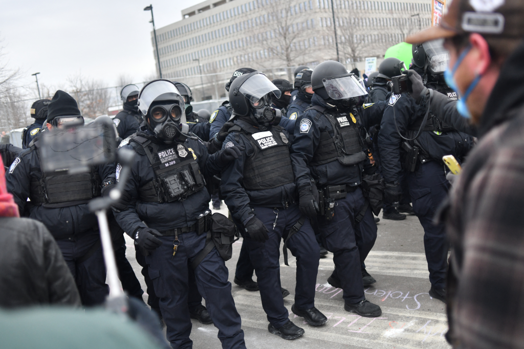 Federal law enforcement agents confront anti-ICE protesters in Minneapolis, Minnesota, on Jan. 15, 2026.