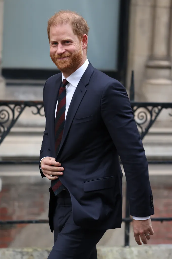 Prince Harry smiles as he leaves court at The Royal Courts of Justice on Jan. 22, 2026.