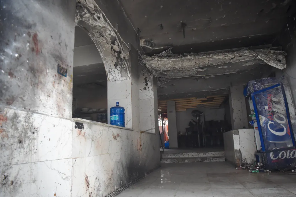 Charred interior of a building after an explosion in Kabul.