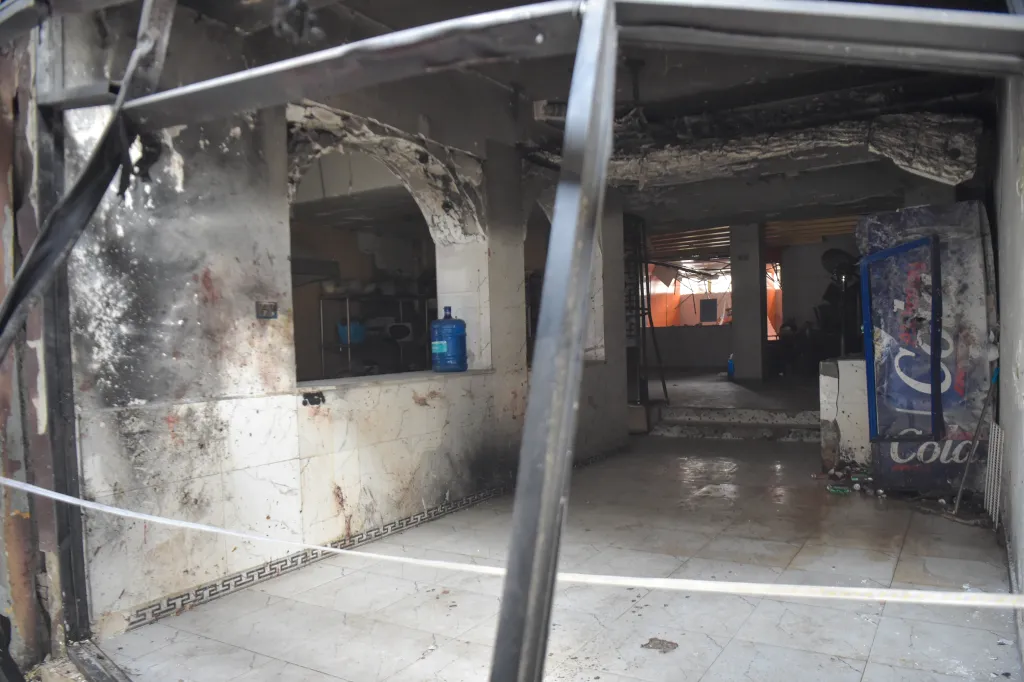 Charred interior of a building after an explosion in Kabul.