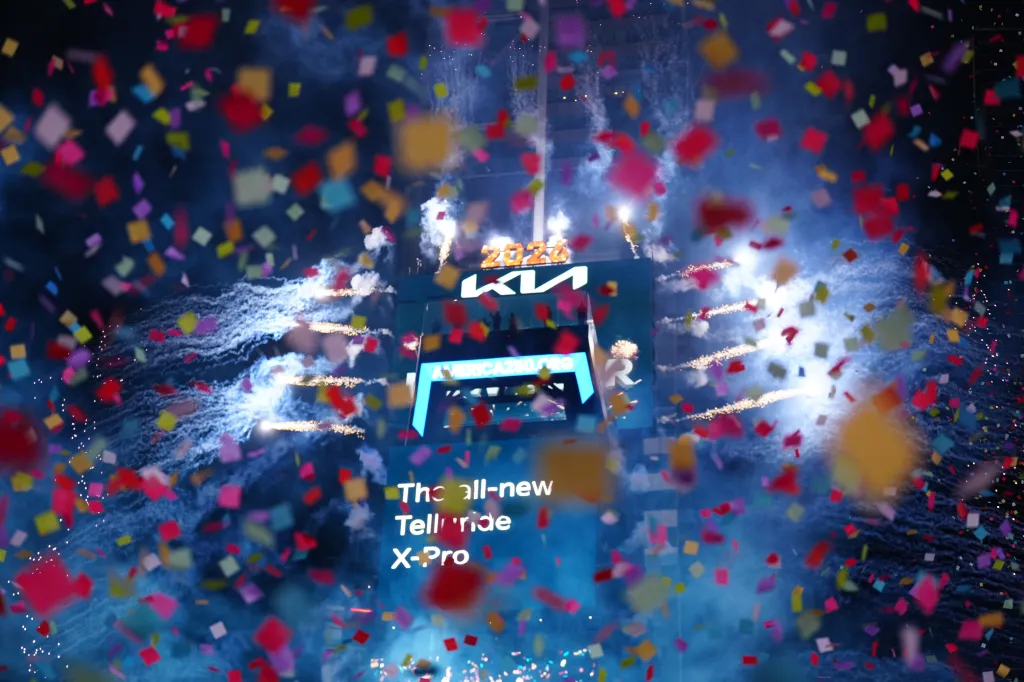 Fireworks and confetti fire out as the Times Square ball drops on New Year's Eve.