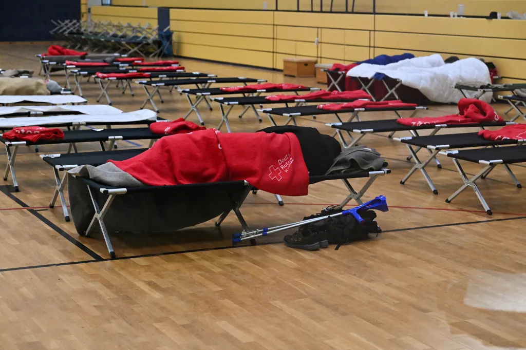 People sleeping in an emergency shelter set up by the German Red Cross in southwest Berlin.