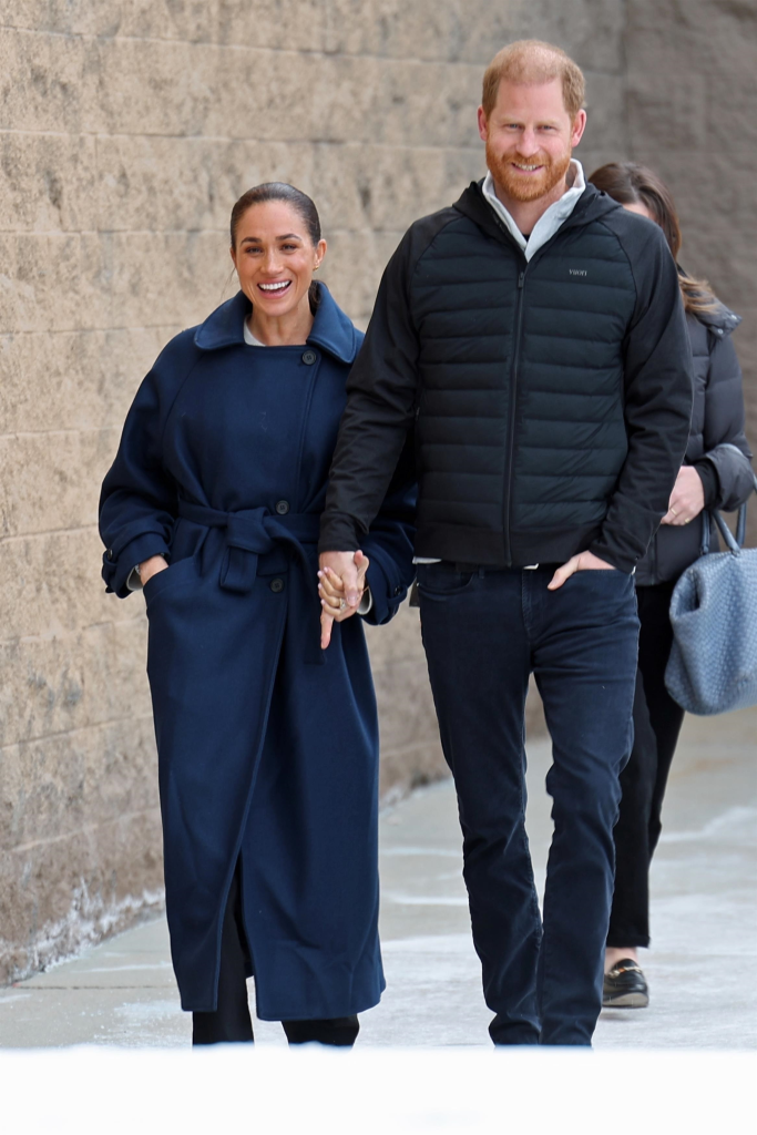 Prince Harry and Meghan Markle holding hands at the Sundance Film Festival 2026.