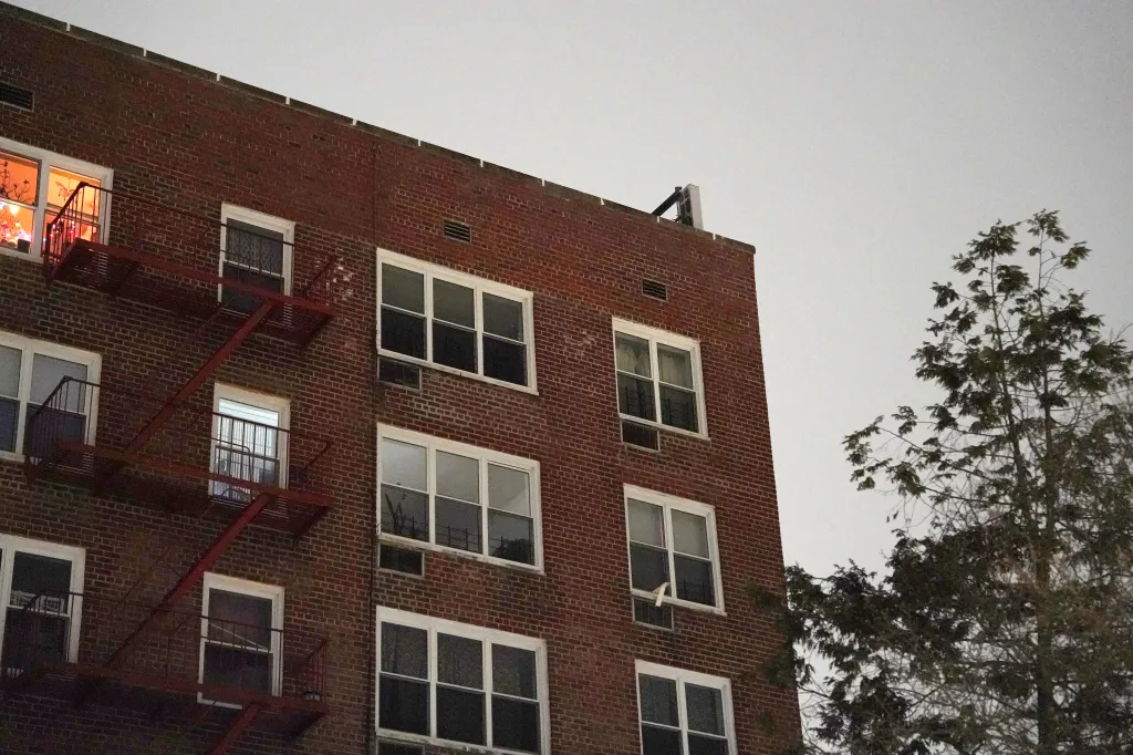 Exterior view of an apartment building in the Bronx.