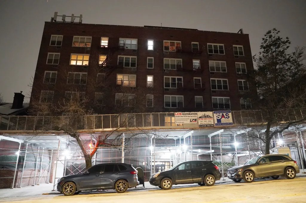 Night view of the brick apartment building at 5730 Mosholu Avenue in the Bronx.