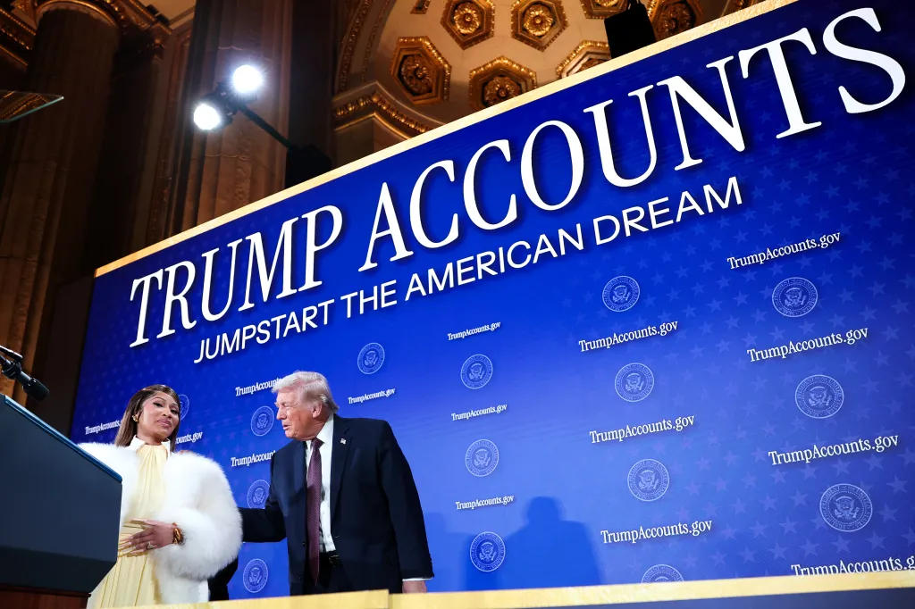 Musician Nicki Minaj and President Donald Trump on stage in front of a