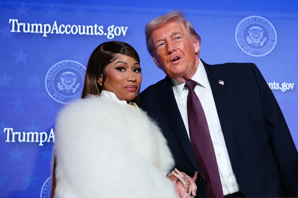 President Donald Trump and musician Nicki Minaj on stage at the Treasury Department's Trump Accounts Summit.