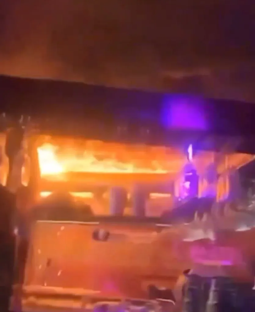 Fire is seen inside the Le Constellation bar and lounge leaving at least 40 people dead and dozens injured, during New Yearâs celebration, in Crans-Montana, Swiss Alps, Switzerland, Thursday, Jan. 1, 2026.