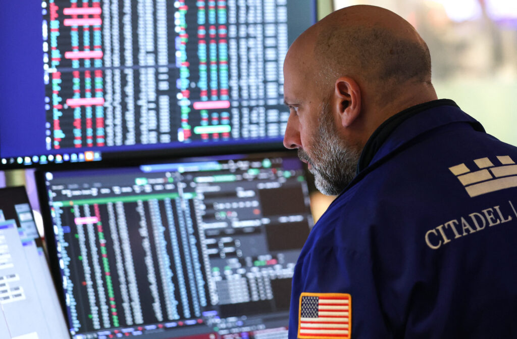 Stocks slide after Trump threatens new tariffs over Greenland