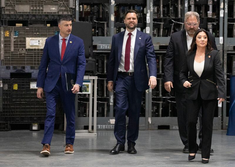HOWELL, MICHIGAN - SEPTEMBER 17: Vice President JD Vance (2nd from left)) tours Hatch Stamping with US Congressman Tom Barrett (R-MI)(L), Dan Craig, President and COO of Hatch Stamping (3rd L), and US Labor Secretary Lori Chavez-DeRemer on September 17, 2025 in Howell, Michigan. Vance spoke about tax cuts that were passed by Congress this year and how they would benefit businesses and families. (Photo by Bill Pugliano/Getty Images)