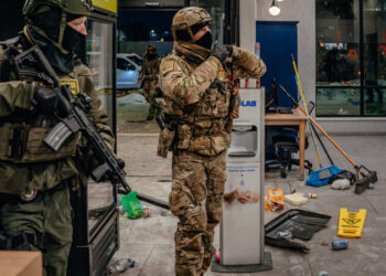 Demonstrators Enter Hotel Vestibule, Setting Off a Fracas