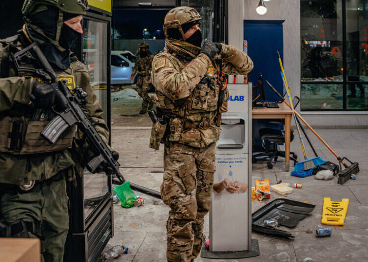 Demonstrators Enter Hotel Vestibule, Setting Off a Fracas