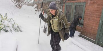 How Many Inches of Snow Fell? She Has a Measuring Stick.