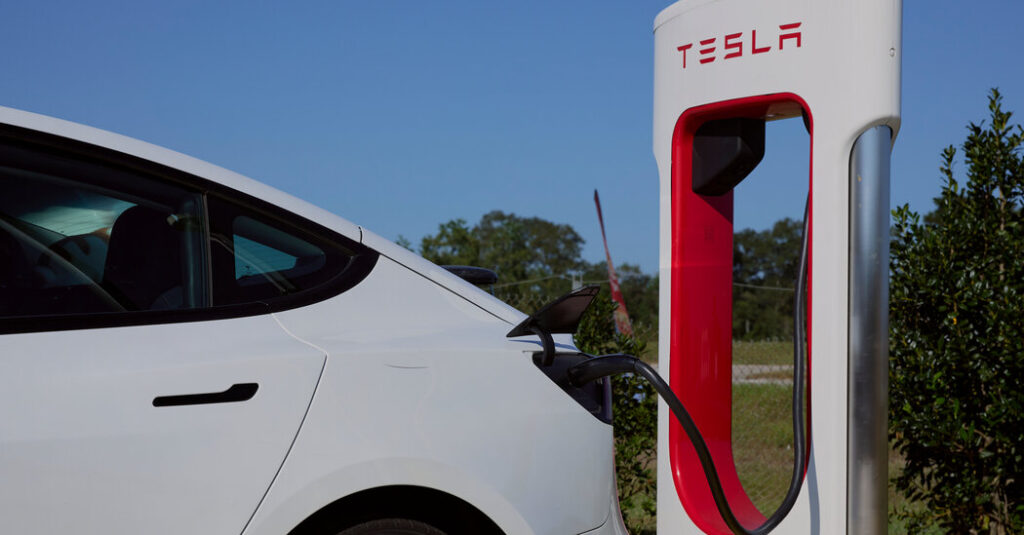 Tesla Profit Slumps, but Investors May Not Care