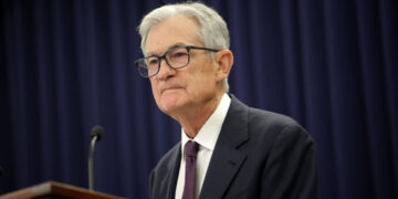 Fed Holds Rates Steady as It Points to an Improving Economy