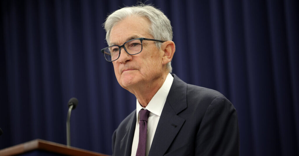 Fed Holds Rates Steady as It Points to an Improving Economy