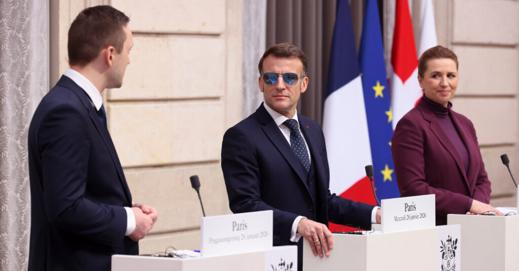 Sunglasses, and Stormy Times, Lift France’s Embattled Leader