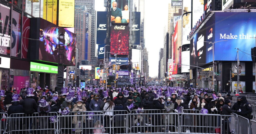 Revelers Crowd Into Times Square to Ring in 2026