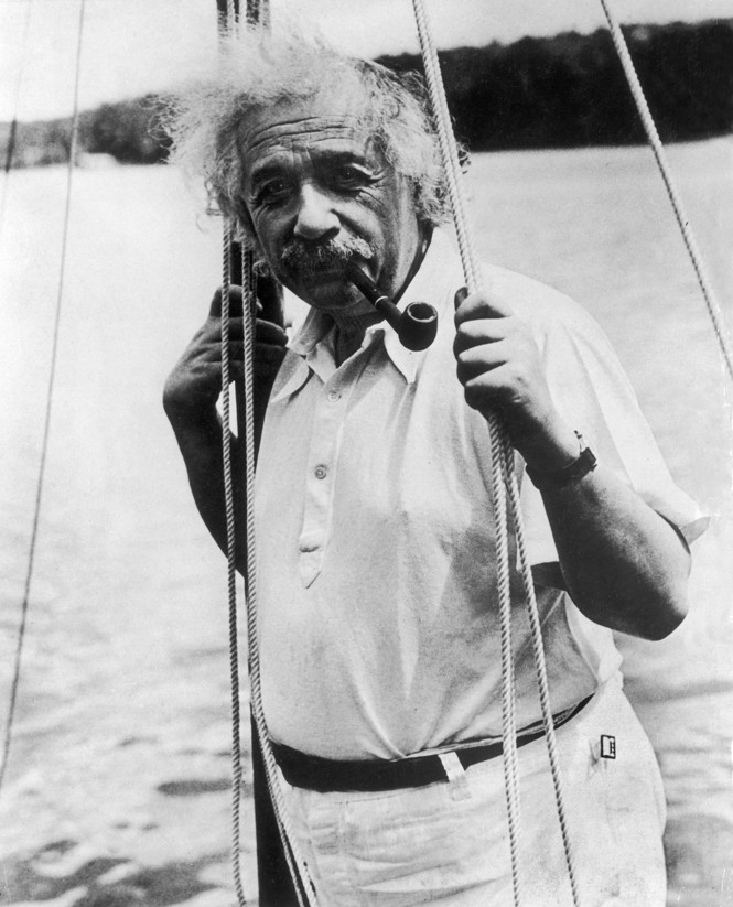 The German physicist Albert Einstein on his small sailboat while on vacation, around 1950