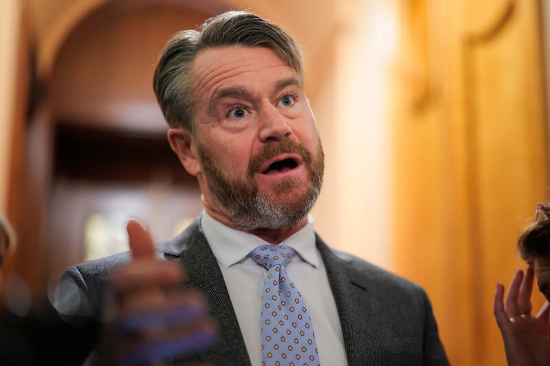 Sen. Todd Young (R-IN) speaks with press before heading into a vote at the U.S. Capitol on January 14, 2026 in Washington, DC.