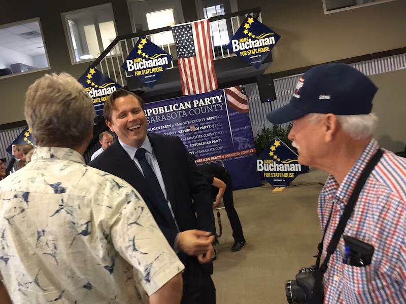 James Buchanan, center, a Republican candidate for state Senate in Florida, at a GOP event in Sarasota, Fla. on February 11, 2018. (Photo by Dave Weigel/The Washington Post via Getty Images)
