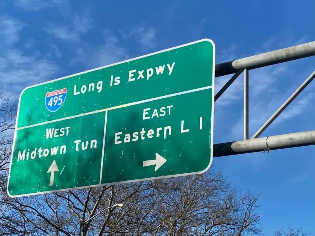 Interstate 495, Long Island Expressway, LIE, road sign with directions to New York City or Long Island. 