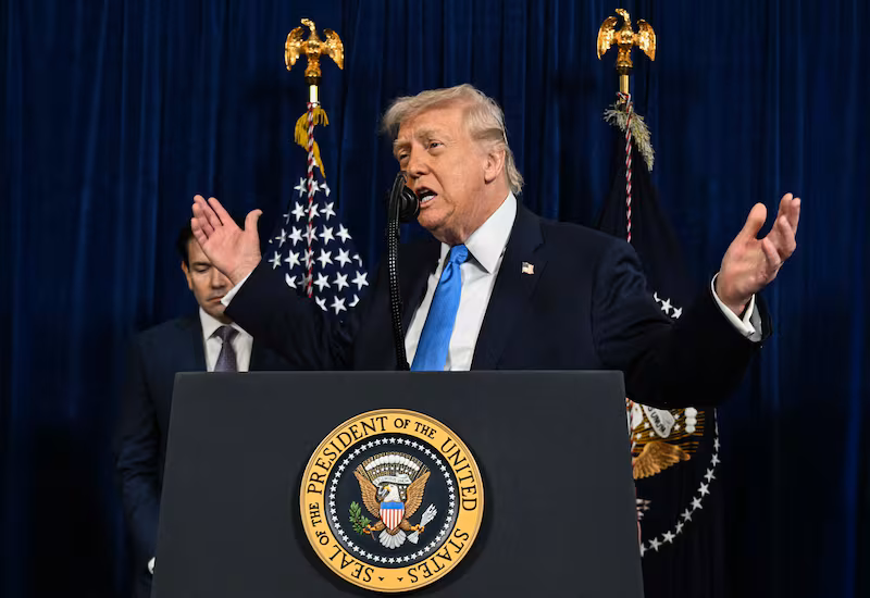 US Secretary of State Marco Rubio looks on as US President Donald Trump speaks to the press following US military actions in Venezuela, at his Mar-a-Lago residence in Palm Beach, Florida, on January 3, 2026.