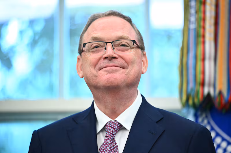 Director of the National Economic Council Kevin Hassett smiles as US President Donald Trump signs executive orders in the Oval Office of the White House in Washington, DC on September 5, 2025.