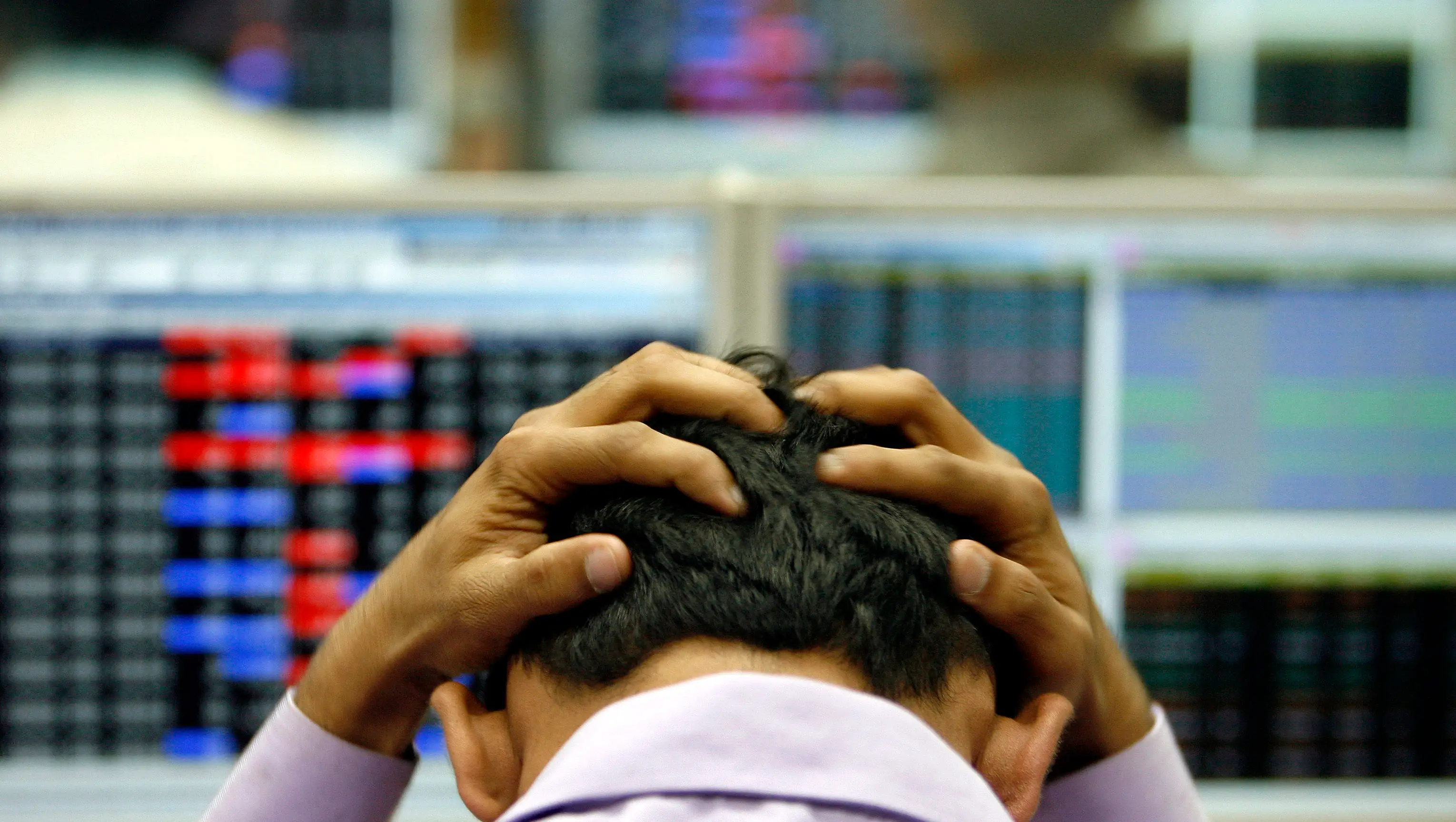 frustrated india stockbroker trader