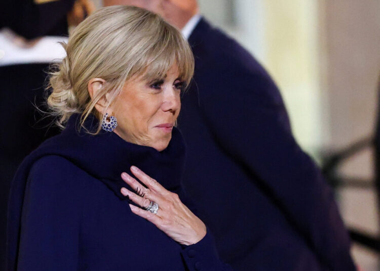 Paris court convicts 10 for claiming French first lady was born a man