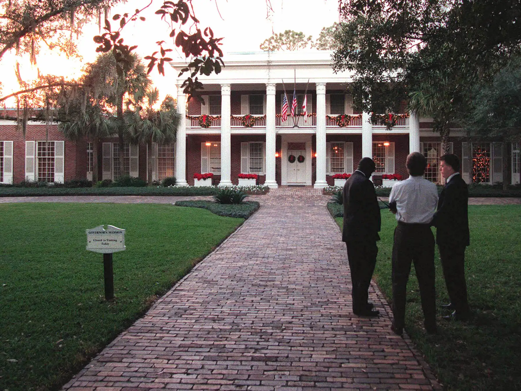 Florida Department of Law Enforcement agents stand guard outside the Florida Governor's Mansion