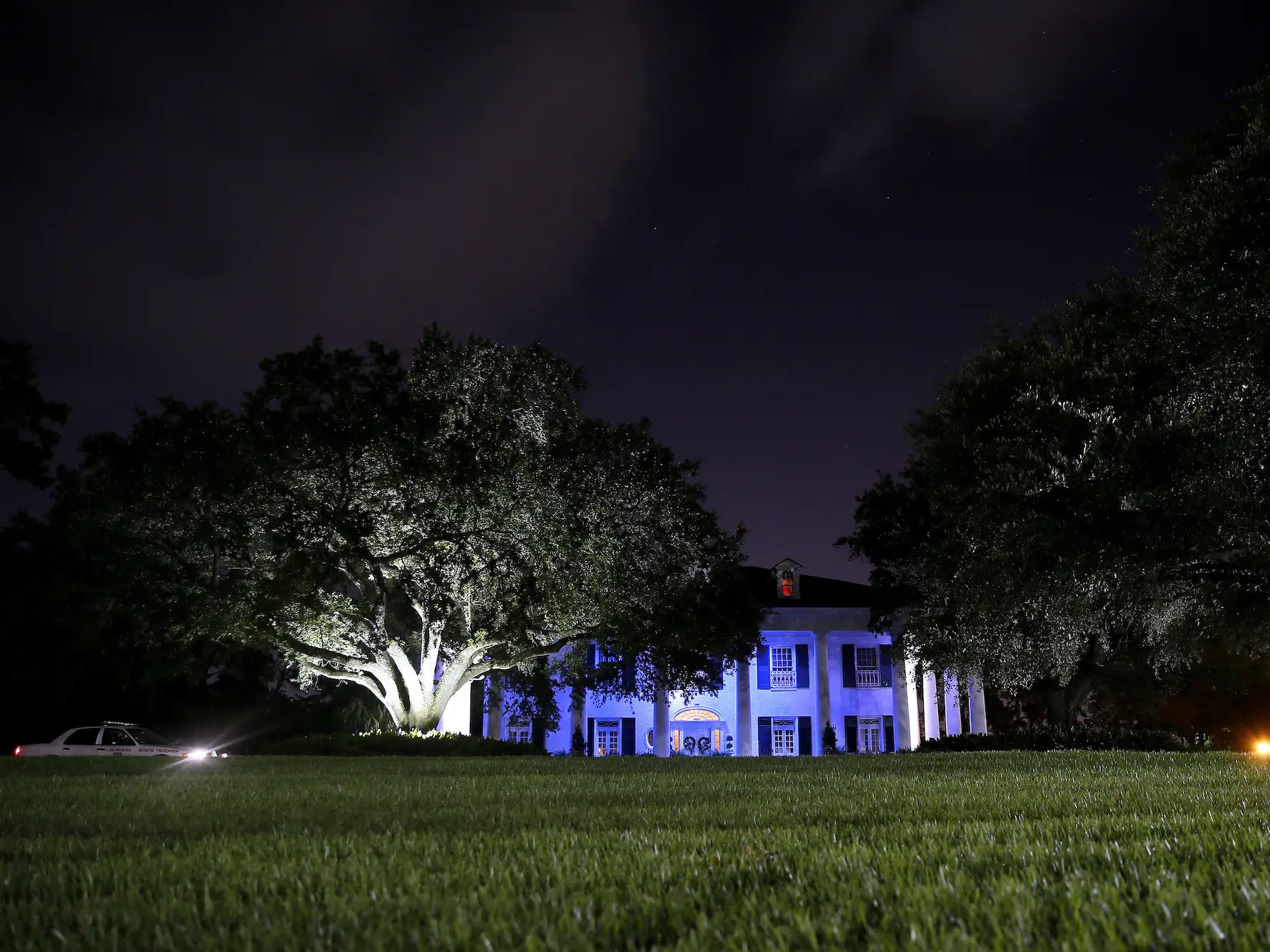 The Louisiana Governor's Mansion is seen lit in blue in honor of Louisiana law enforcement in Baton Rouge