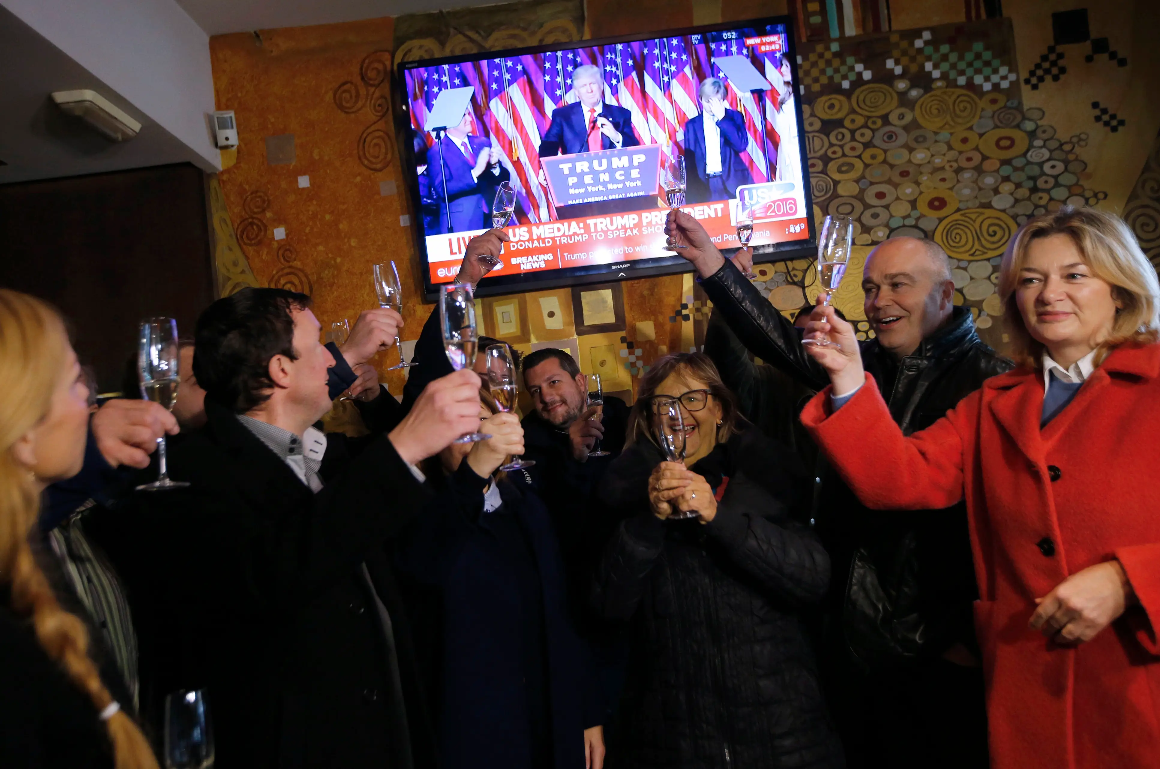 Residents of Sevnica, Melania Trump's hometown in Slovenia, celebrate Trump's victory on election night in 2016