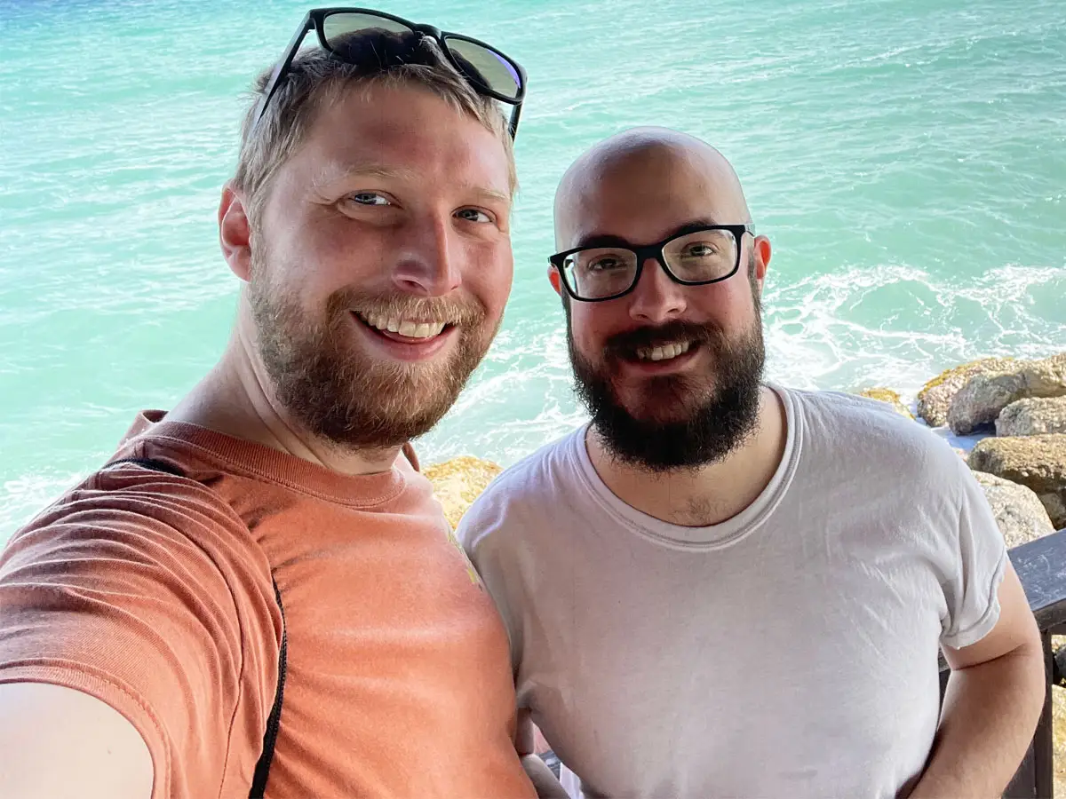 Timothy Moore and husband selfie in front of water at Jewel Grande in Montego Bay